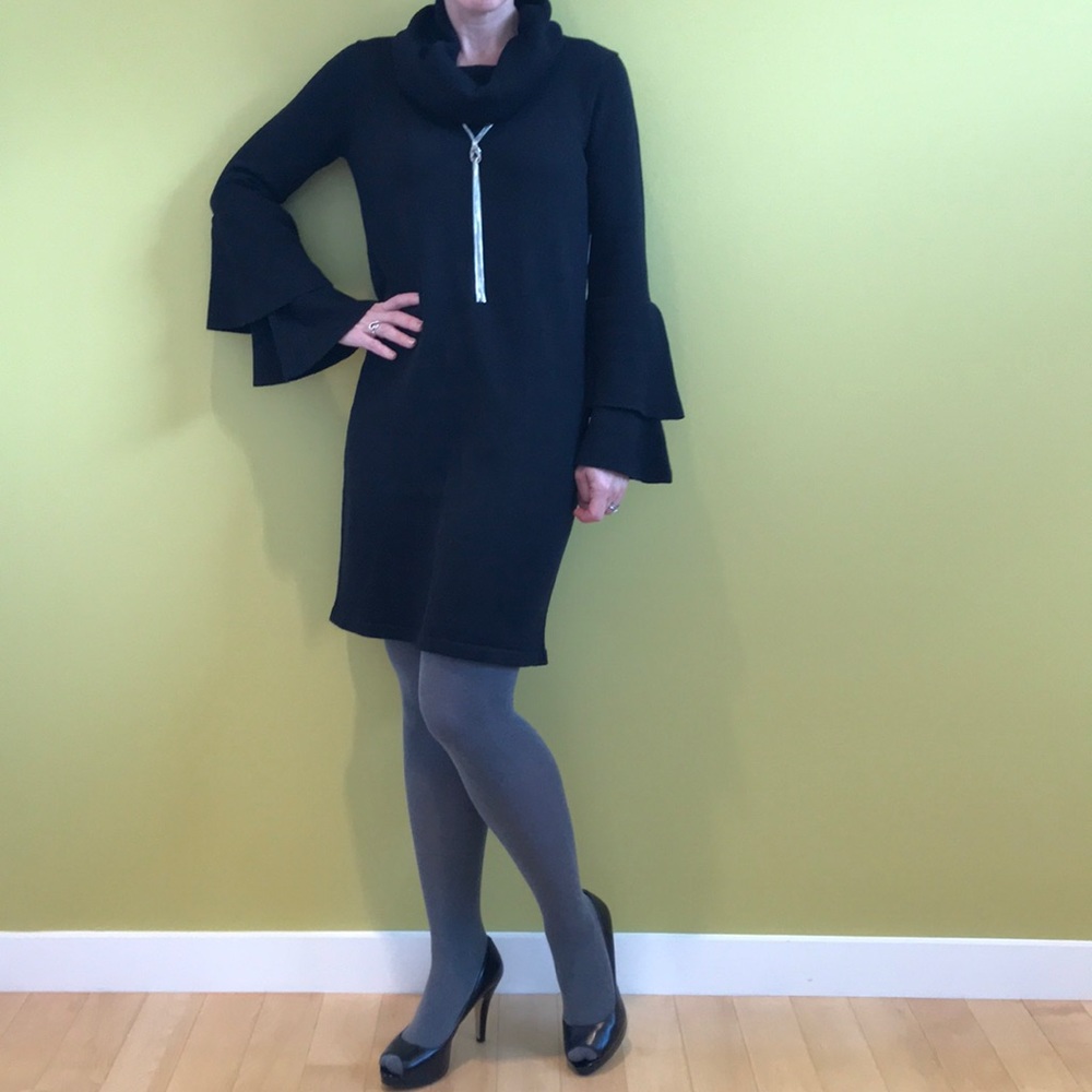 Black knit dress with double bell sleeves